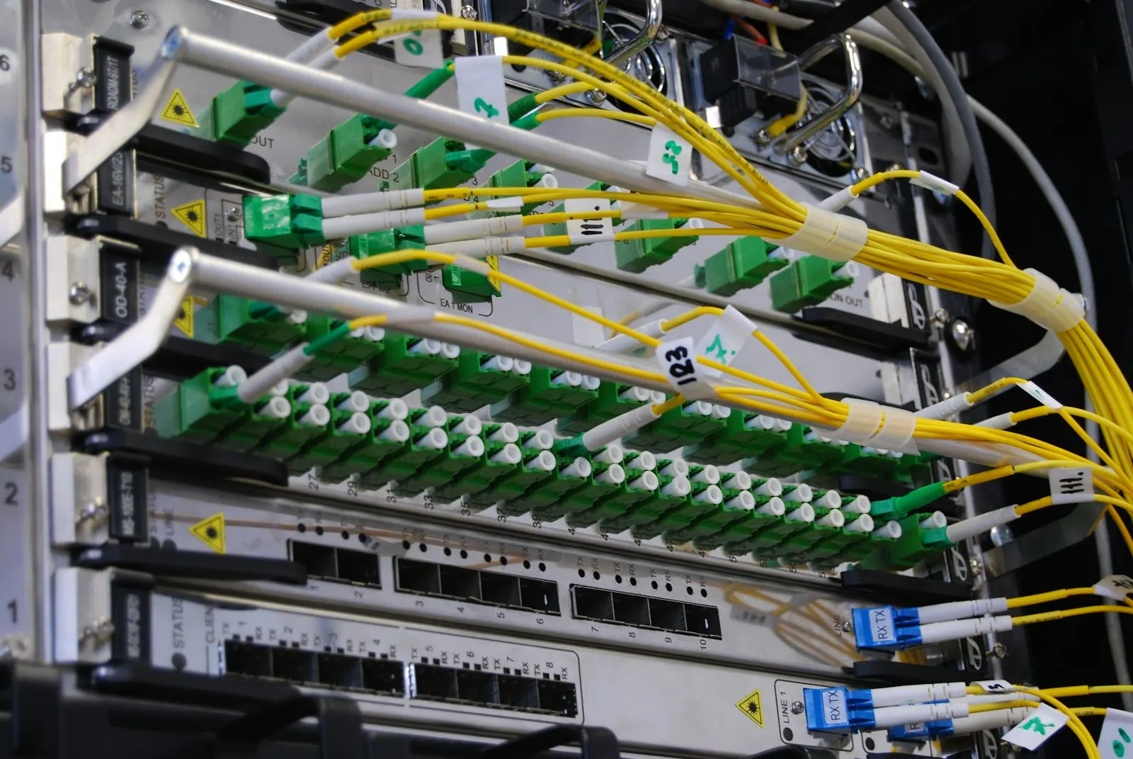 Fibre-optic network cables in a server rack